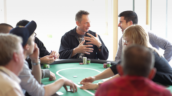 People Playing Poker at Table